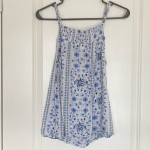 White and blue floral shirt